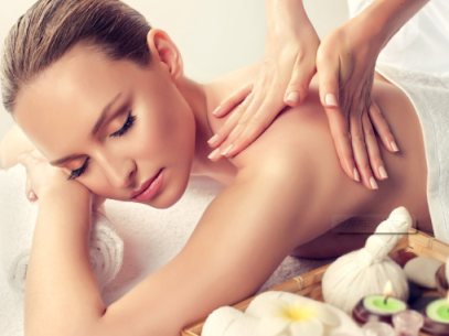 Massage pressure applied to the upper back to ease muscle tension